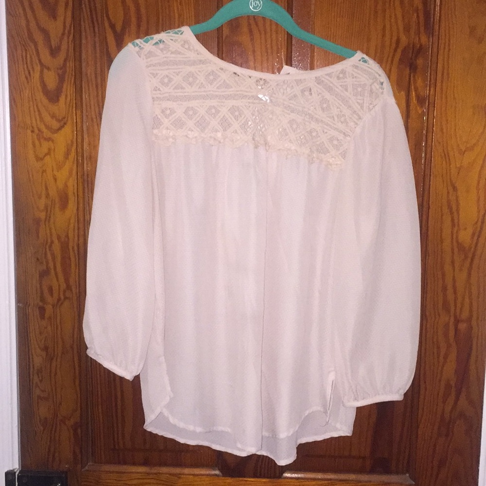 Light blush/cream color blouse